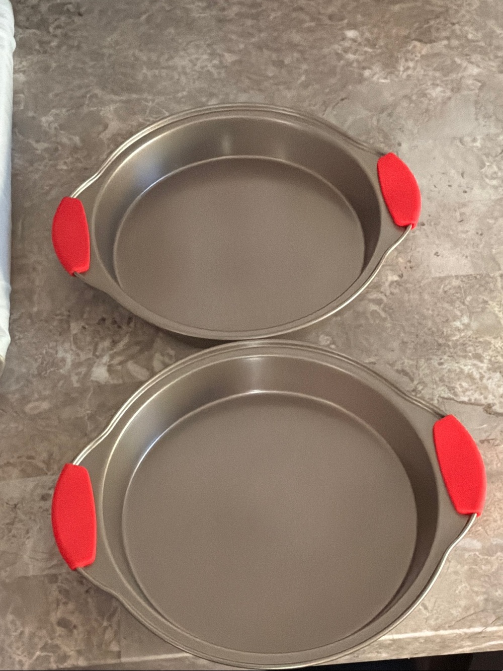 Gray Round Baking Pans with Red Silicone Handles - Set of Two 9”
